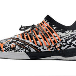 Chuteira Futsal Puma Future Z 1.3 IC Preto, Branco e Laranja "Teaser"