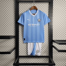 Manchester City 23/24 Kit Criança Principal